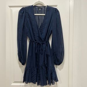 Blue ruffled cocktail dress
